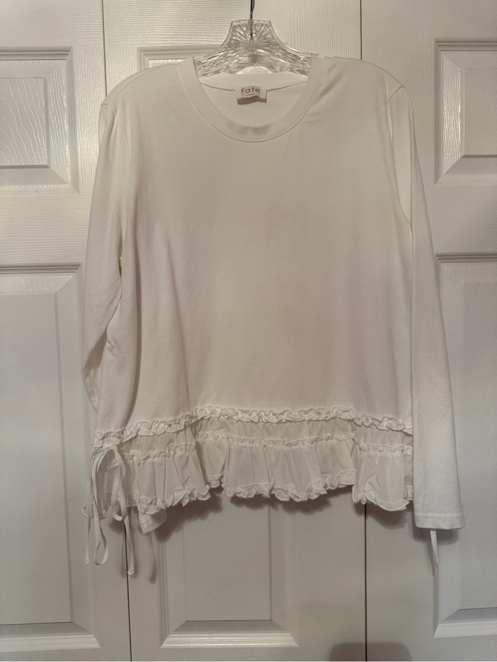 Fate White Long Sleeve Top with Ruffle Hem and Side Tie
